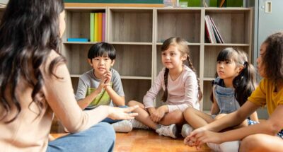 Students use mindful breathing to regulate their emotions.